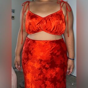 Hot red two-piece, small top a long skirt